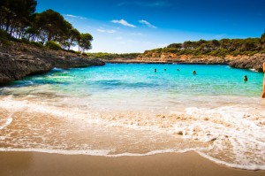 Beautiful view of Mediterranean beach with clear blue sky and se